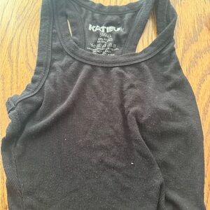 katiej juniors small tank top. Runs small. my 11 year old wore last year